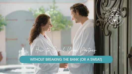 Couple smiling at each other in spa robes at Spa Durban, enjoying affordable luxury and connection with unbeatable Durban spa prices.